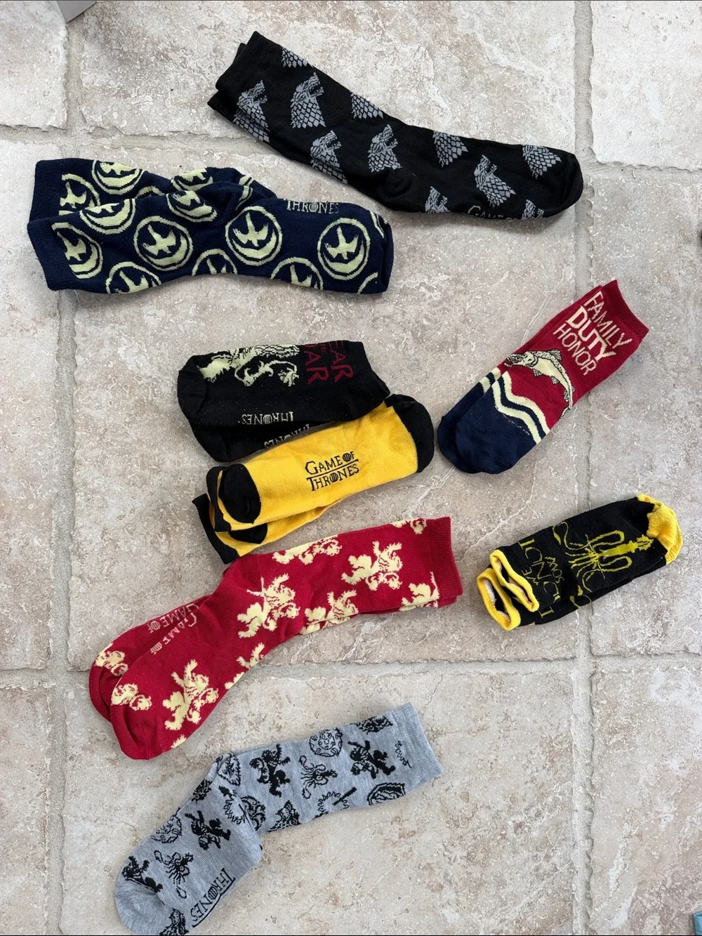 Game of Thrones assorted socks unisex worn , but lots of life left in them.